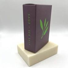Load image into Gallery viewer, Bar soap with gray purple packaging called 'Sage + Sea Salt'
