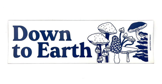 Magnetic bumper sticker that says 'down to earth' and has mushroom drawings